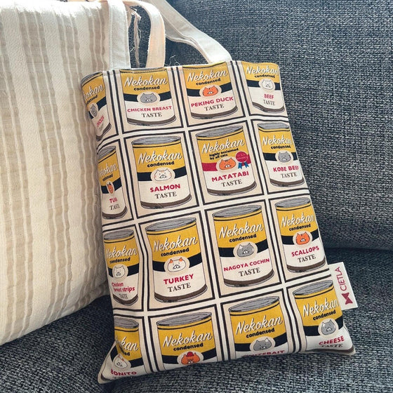 CIETLA Nekokan Cat Condensed Tote Bag Yellow on sofa