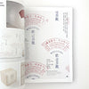 Open book with 'Welcome' text and red stamp design on a white background