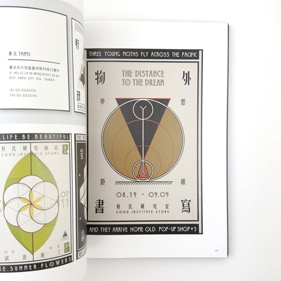 Open book with a design featuring text and geometric shapes on a white background