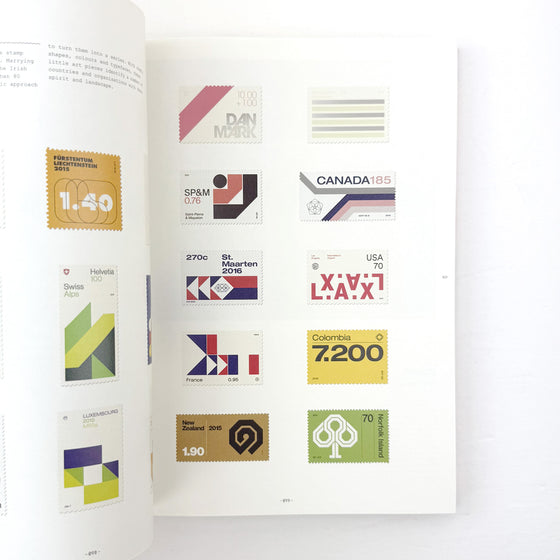 Open book displaying various design elements and stamps on a white background
