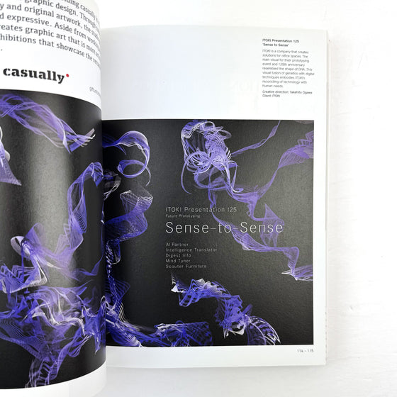 Open book with artistic design on a white background